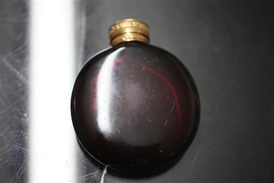 A 19ct century gold topped moon shaped ruby glass scent bottle, 3.25in.